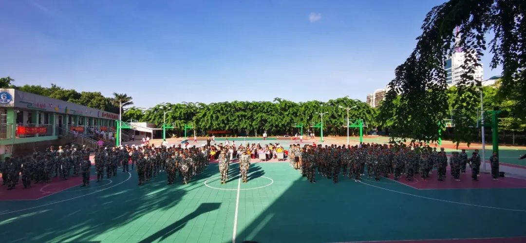 迷彩青春 乘風起航——記?？邳S岡金盤高級中學初中部2020級新生軍訓總結(jié)大會